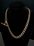 Antique graduated curb watch chain with a dog clip, t-bar, and split ring