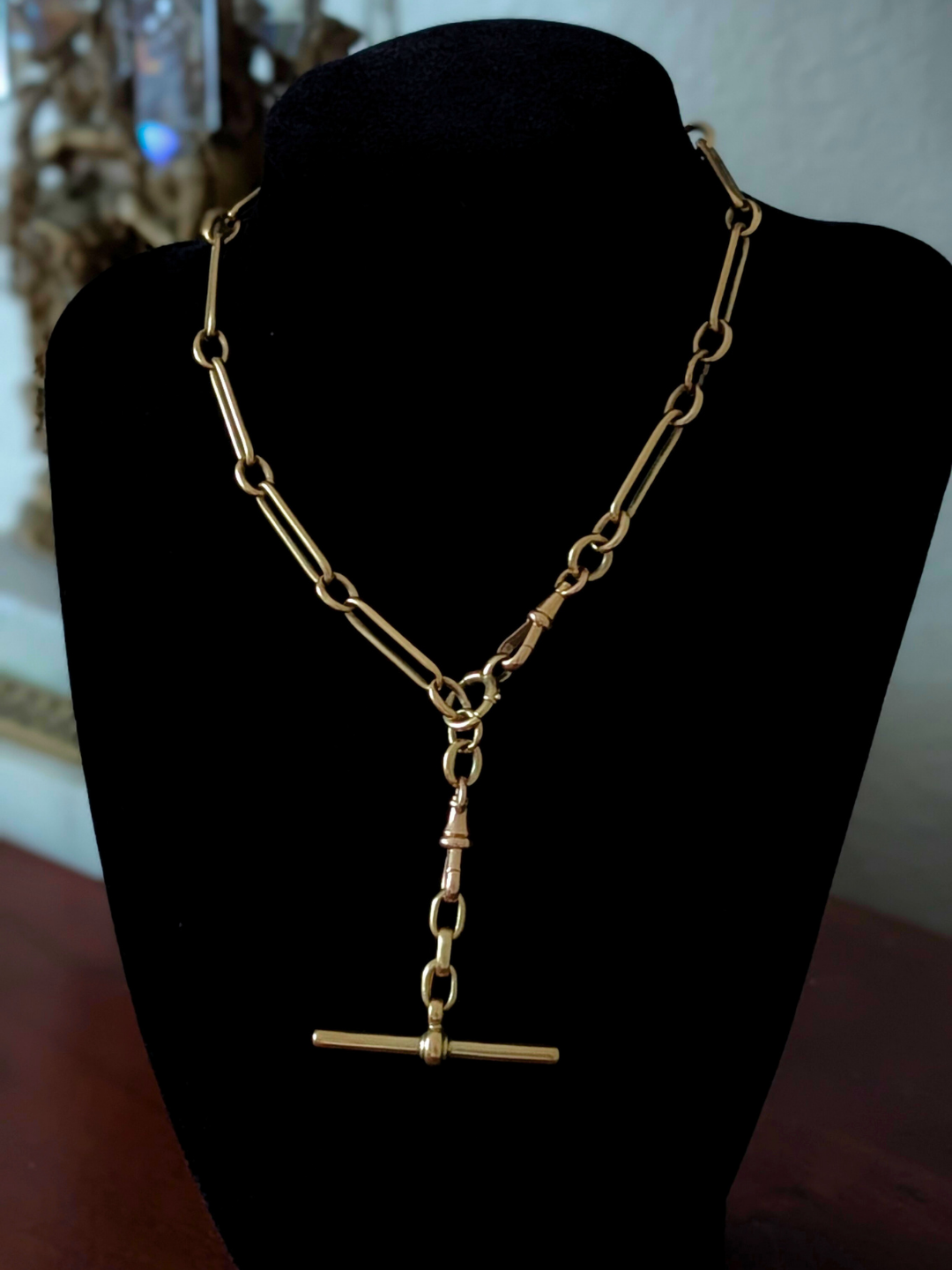 Antique 18ct Trombone Watch Chain with two dog clips, an oversized bolt clasp, and t-bar